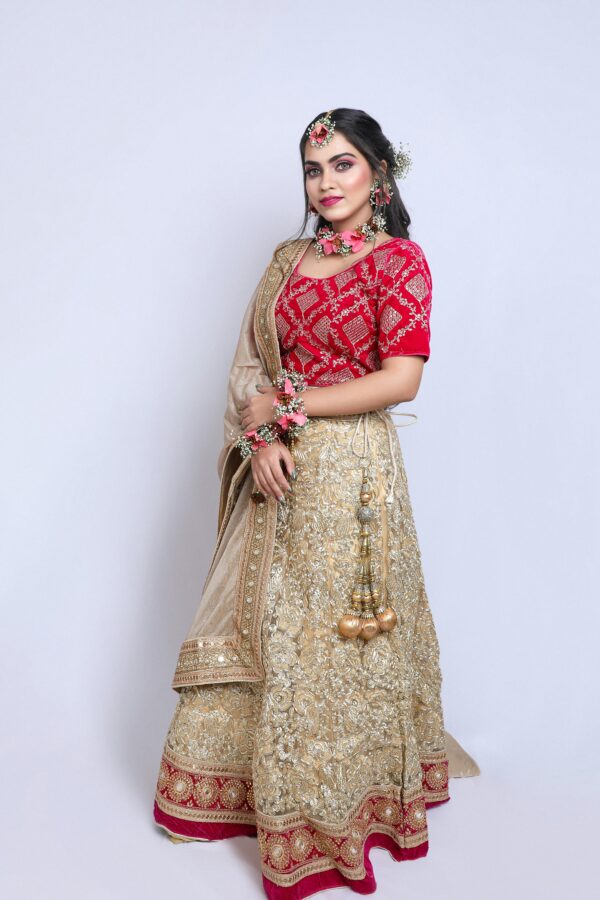 Elegant Red and Golden Bridal Lehenga with Floral Jewellery
